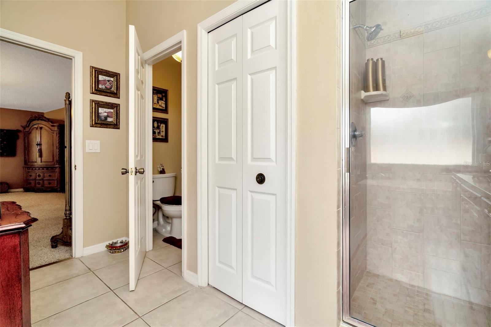 Large shower and separate water closet or "private library"