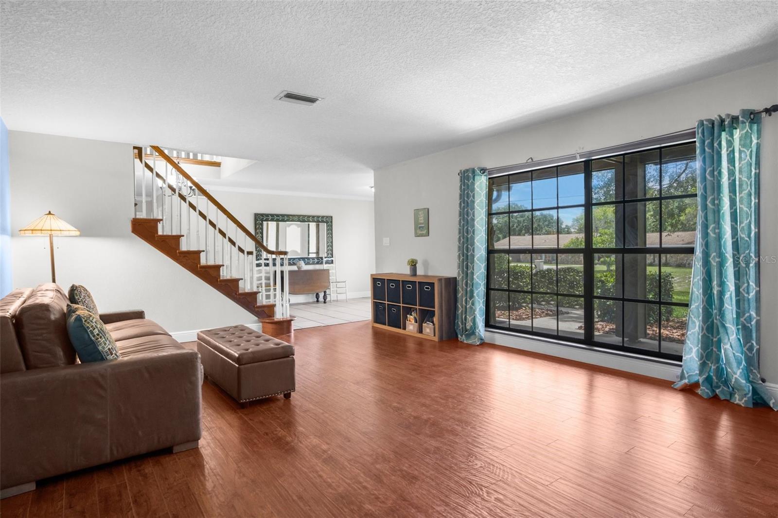 Living room with wood burning fireplace