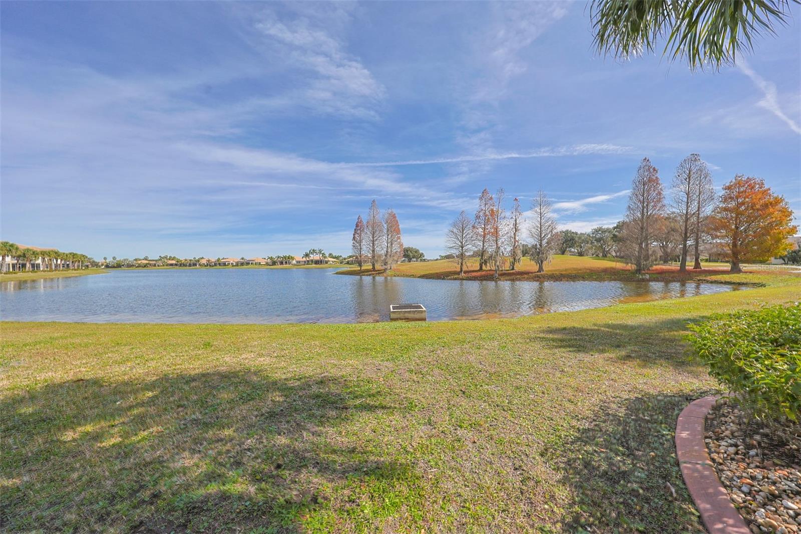This condo unit backs up to a large, beautiful pond.