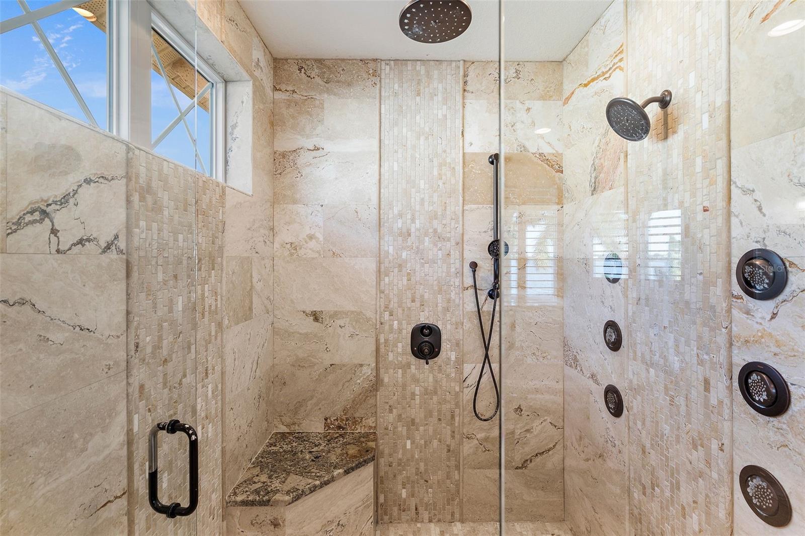 Walk in shower with multiple shower heads