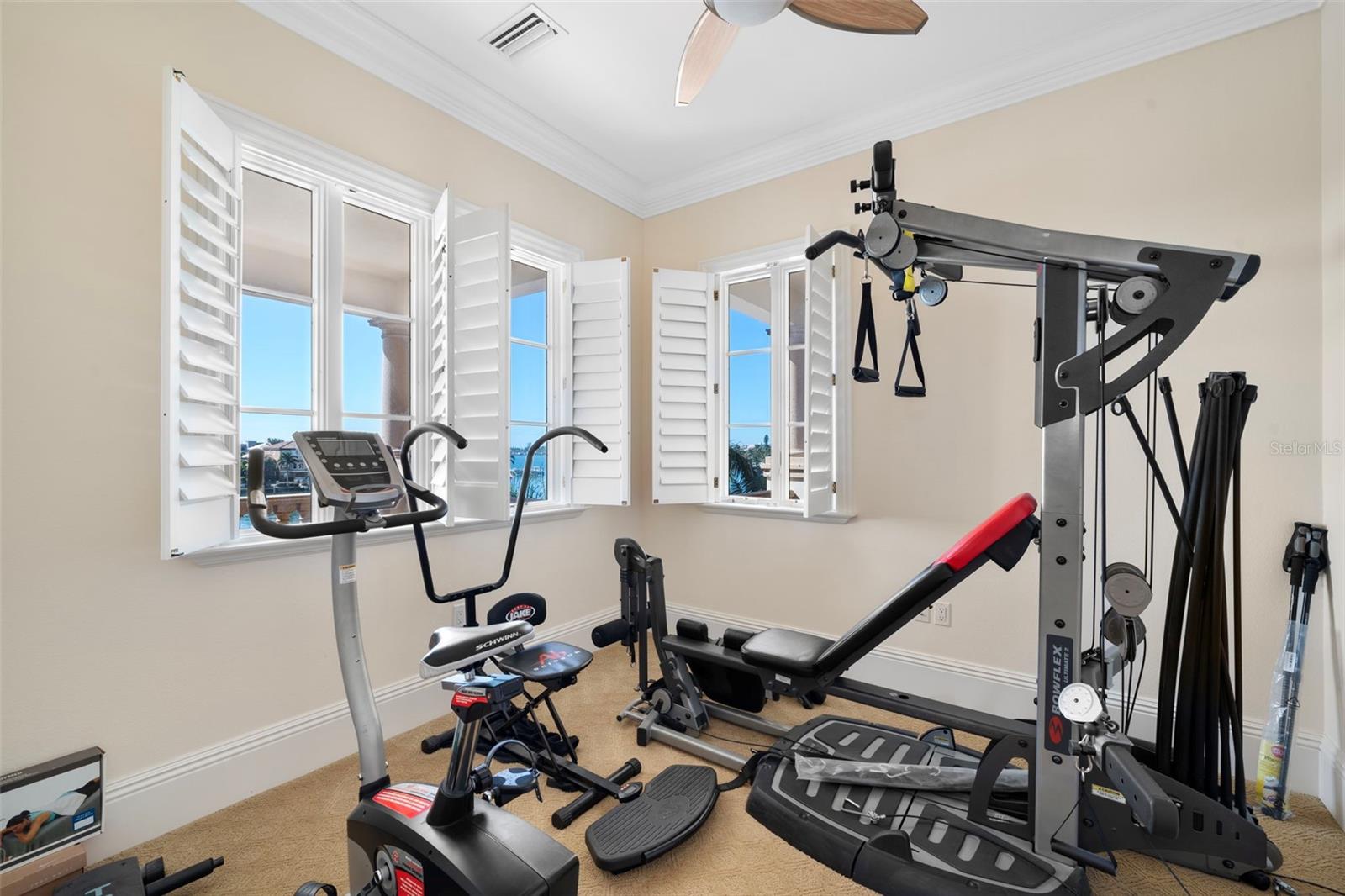 Primary suite with a gym