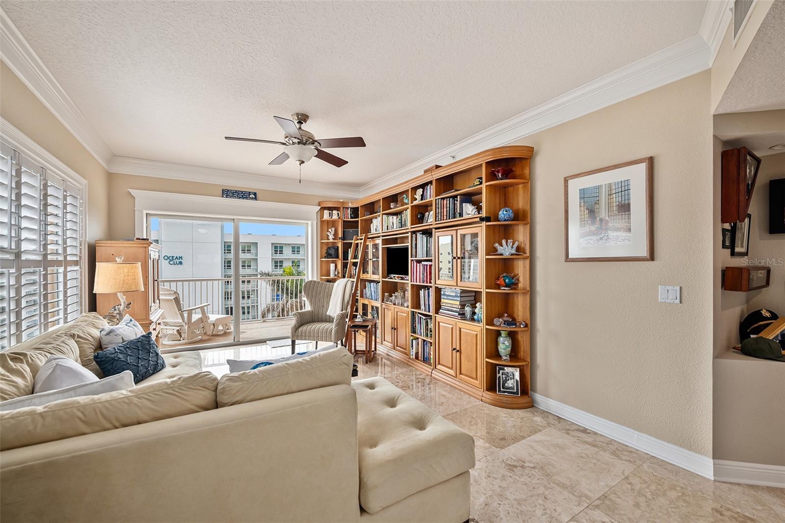 Exceptional crown molding, plantation shutters, luxury appointments and more define this condo.  Spacious Family Room offers additional space for guests and more!
