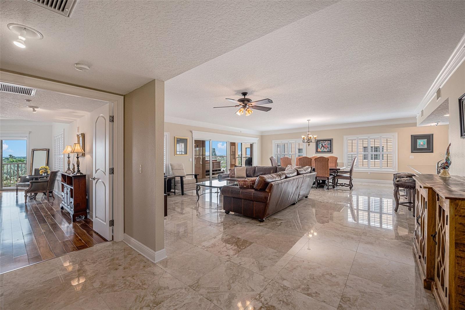 The perfect home to entertain with an open countertop bar from the kitchen, overlooking the expansive dining room and great room. Enjoy your waterfront views, pool, and boats! Sliding doors open fully to experience Florida breezes and a covered patio with your own private swim spa.