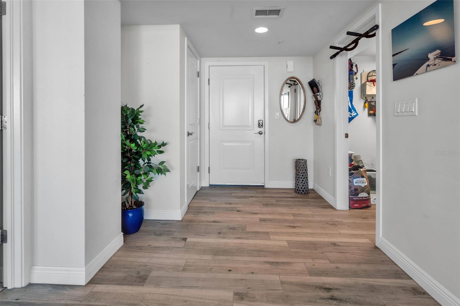 Entryway with large laundry room/storage space