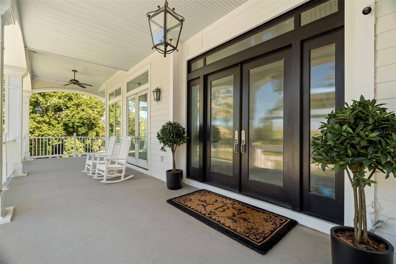 Elegant front entry area and welcoming porch.