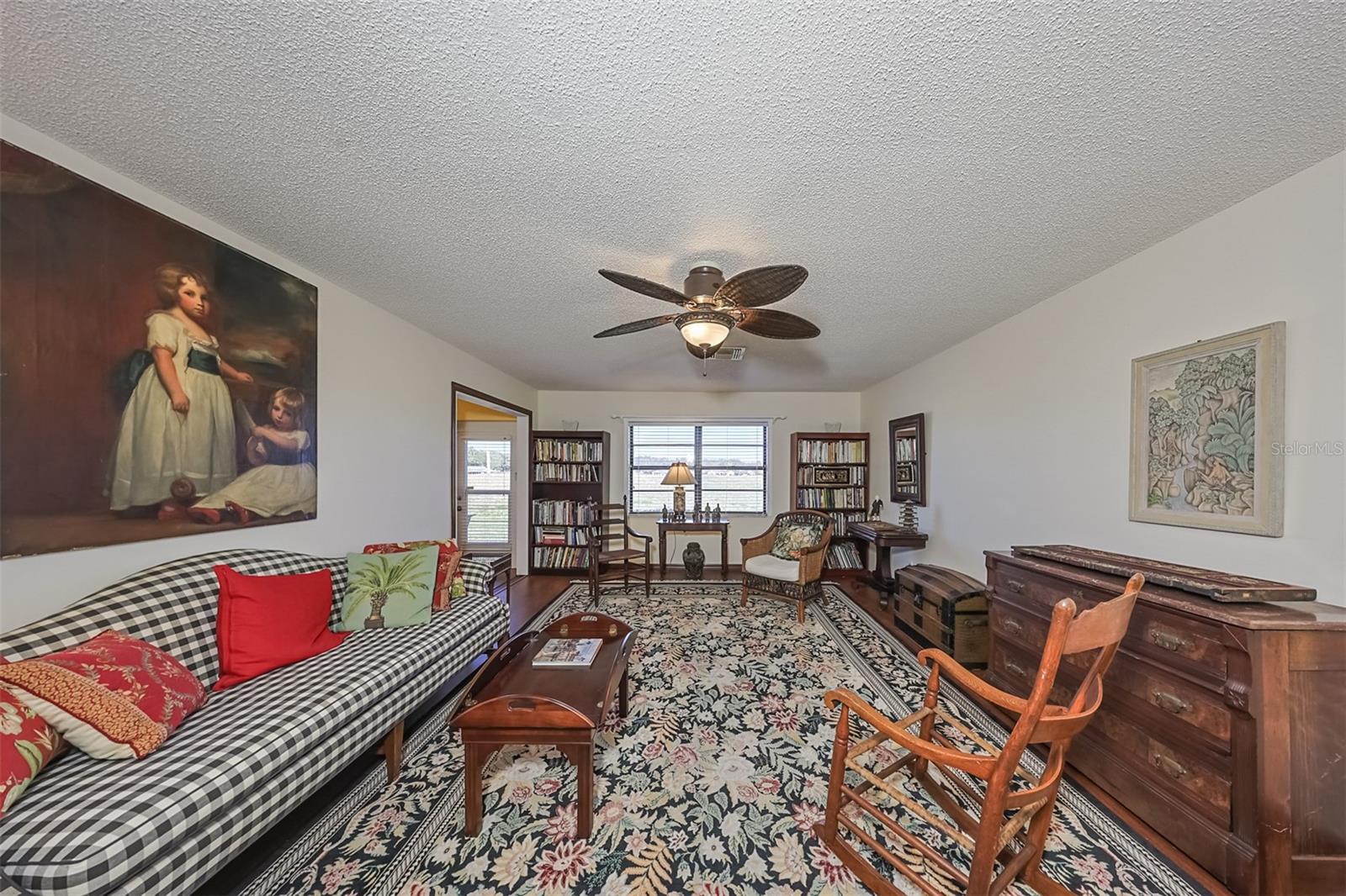 Living Room is large and spacious with easy access to the Florida room and dining room.