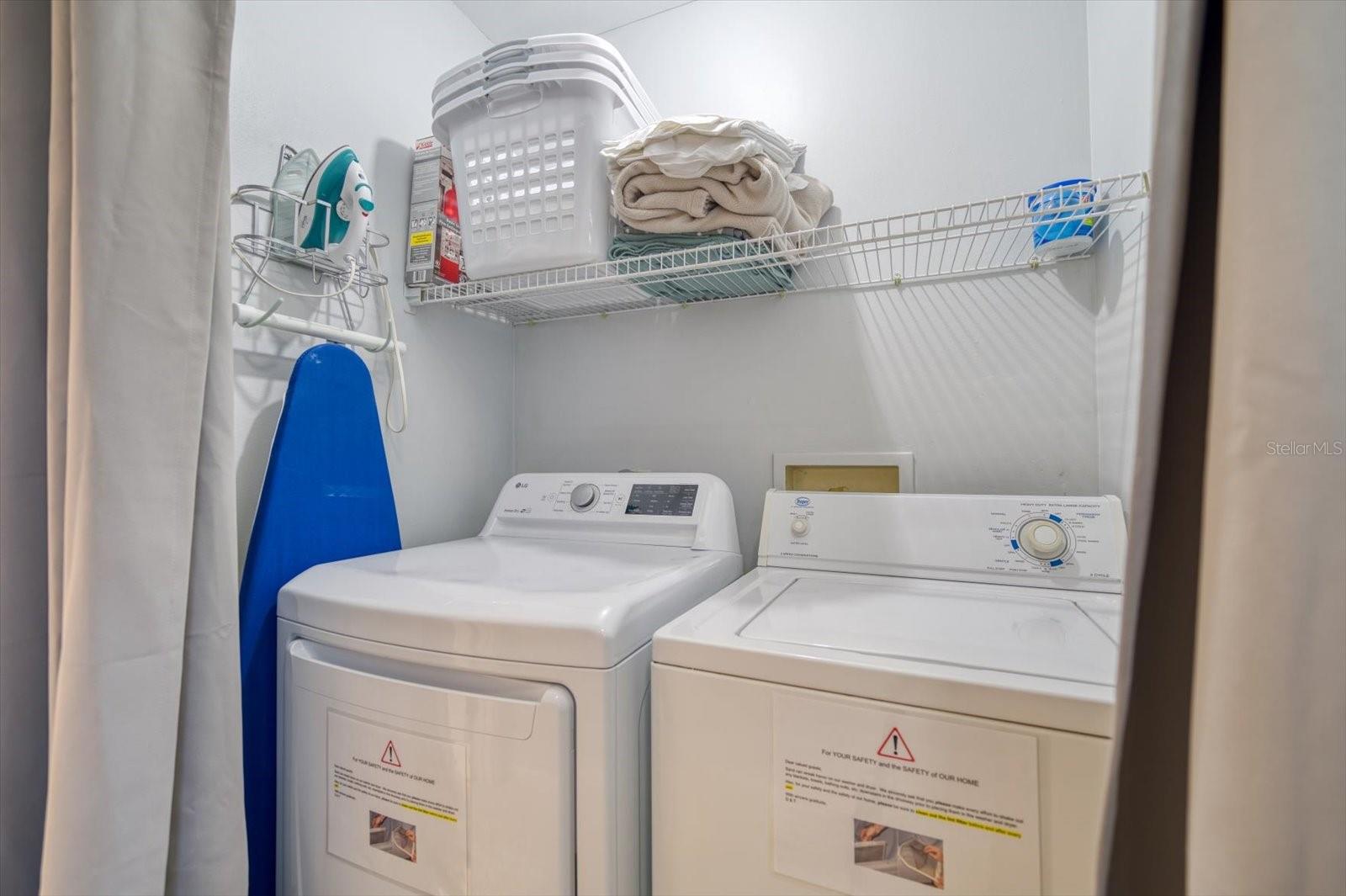 Washer & dryer is located at the top of the 2nd floor landing just outside the primary bedroom
