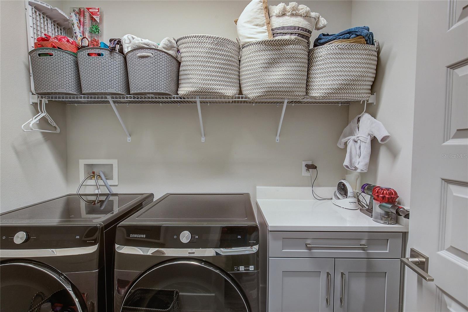 ROOMY LAUNDRY ROOM OFF THE KITCHEN FOR CONVENIENCE