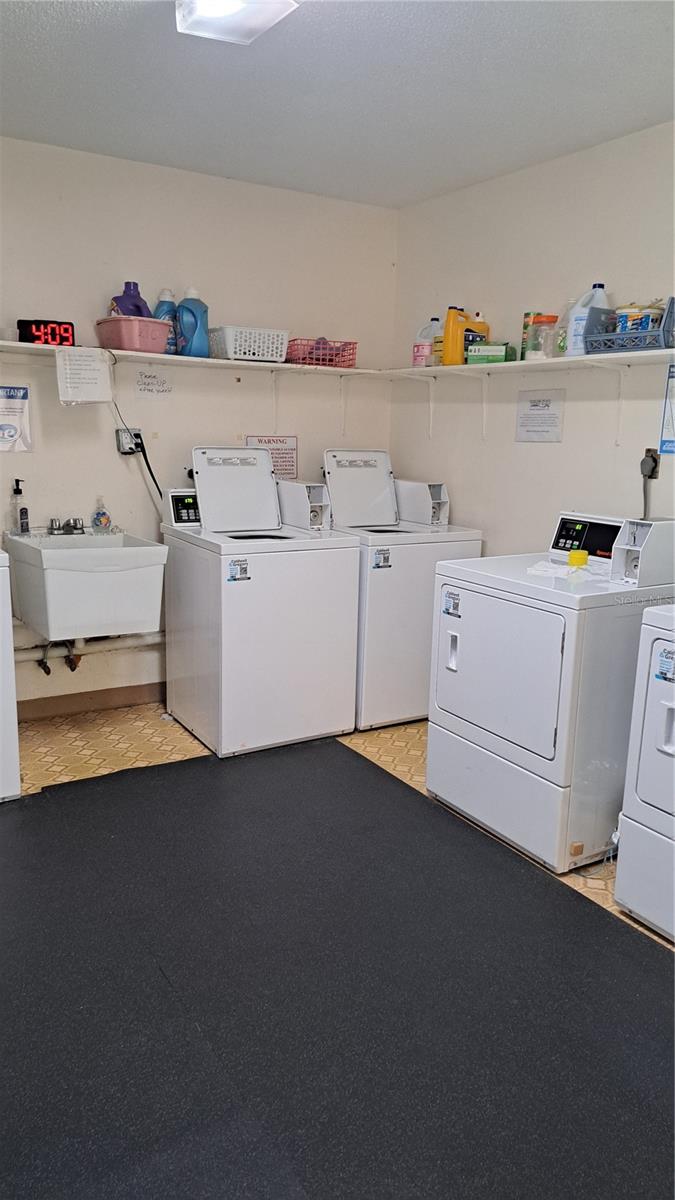 3 washers and 3 dryers same floor as unit!