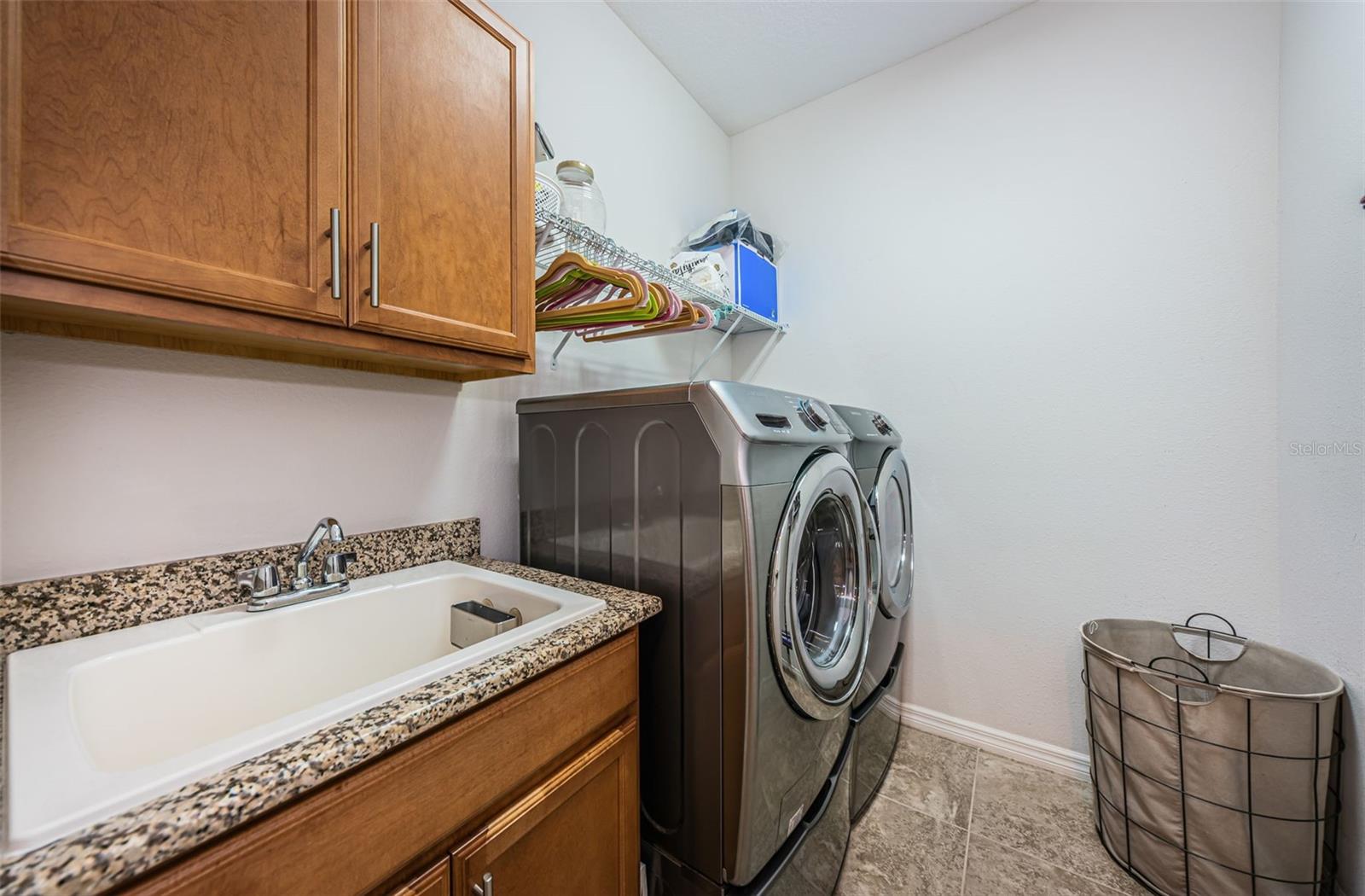 Utility Room with full sized washer and dryer