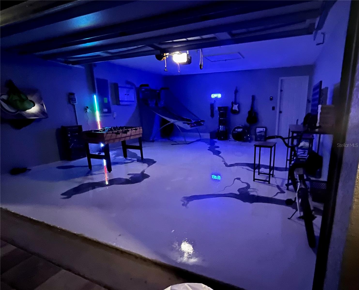 Garage at night with games and epoxy floors