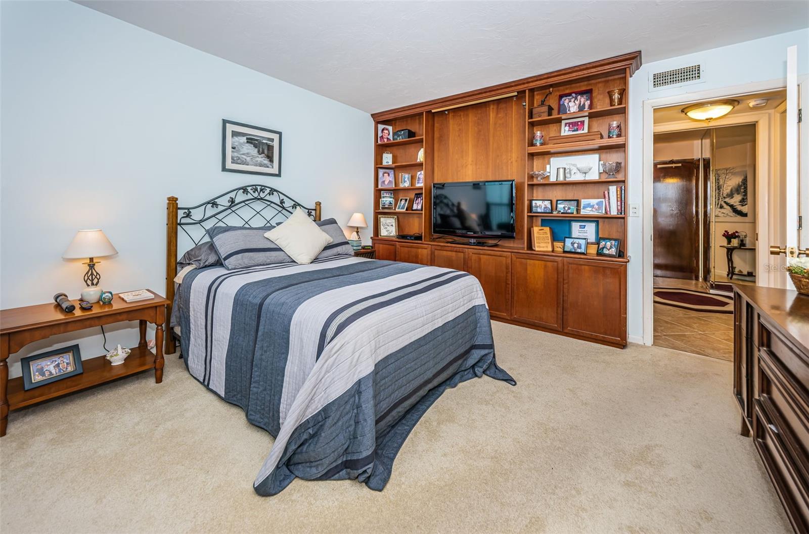 Second bedroom with built-in entertainment center