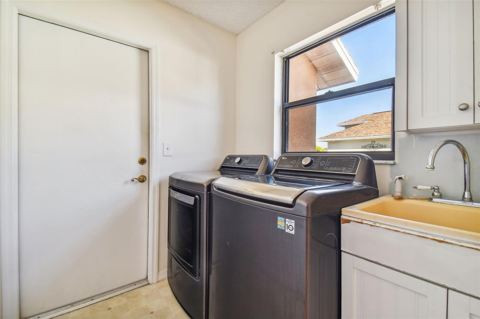 Laundry off kitchen to garage