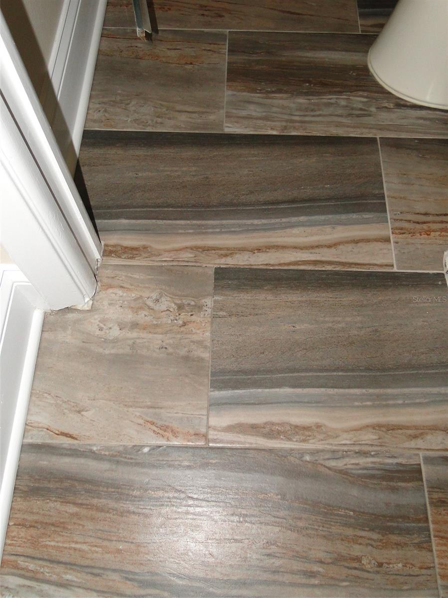 Tile Flooring In bathroom area and Closet