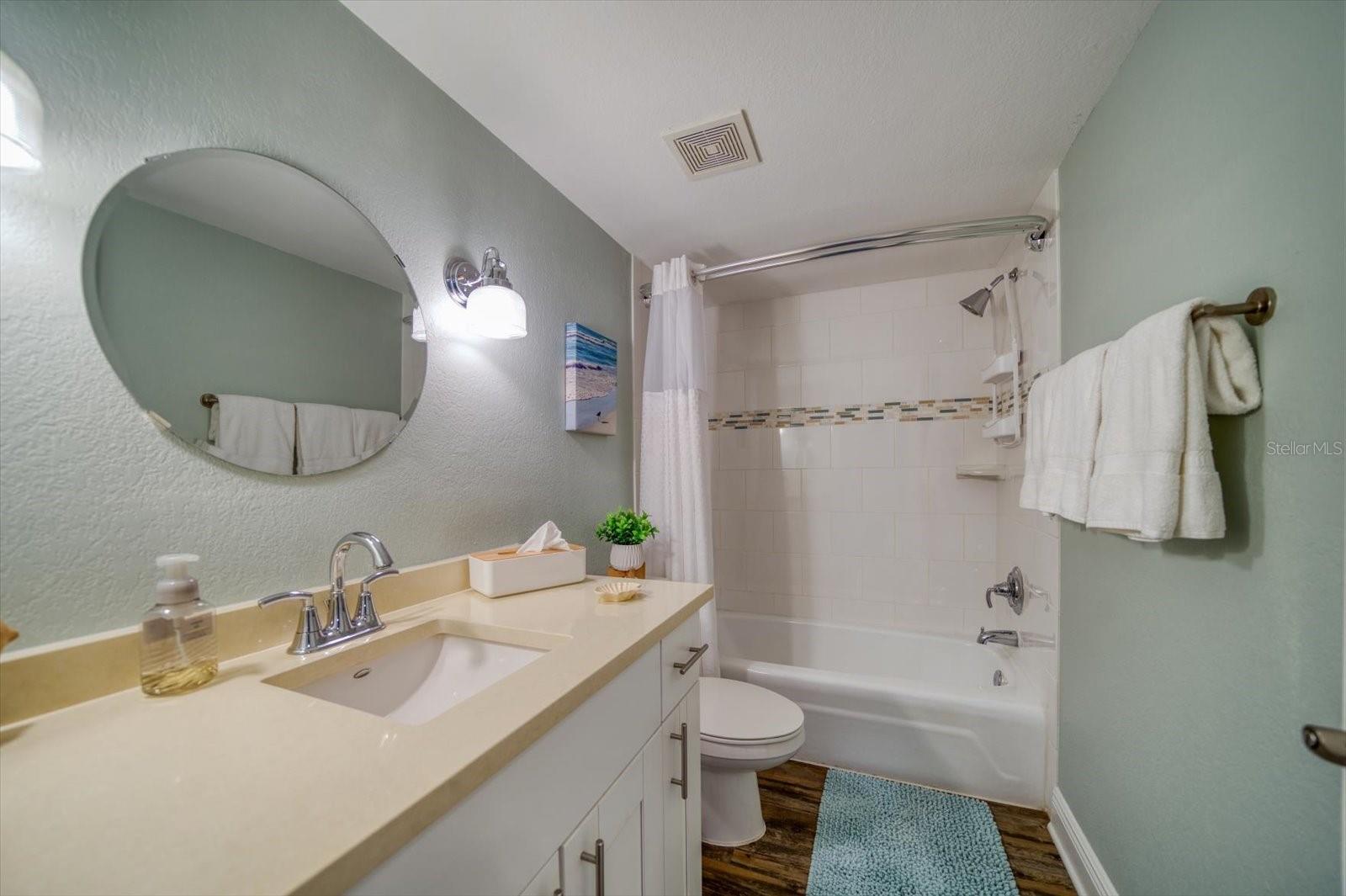 Updated main bathroom with tub/shower combo.