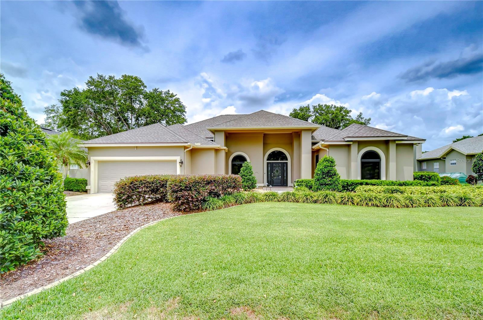 Spectacular pool home nestled on an oversized lot in desirable River Hills community!