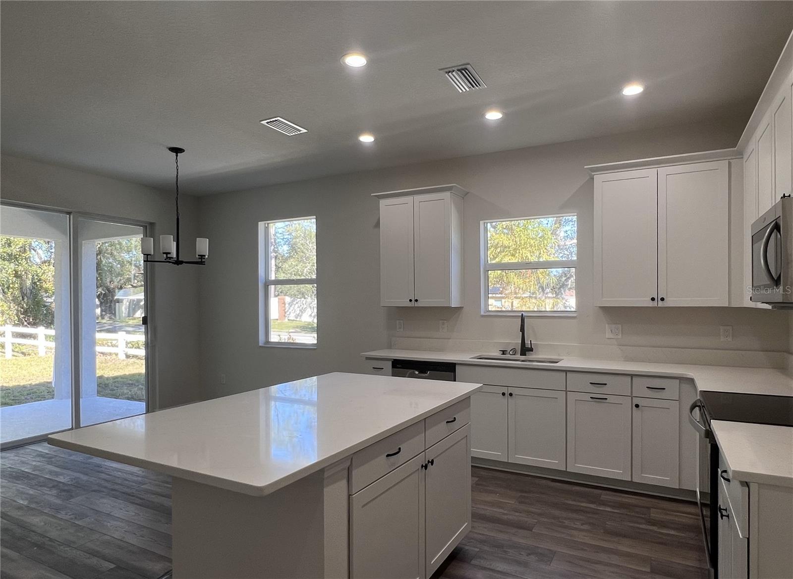 Kitchen with lots of Cabinets Space, Includes Range, Microwave Hood & Dishwasher!