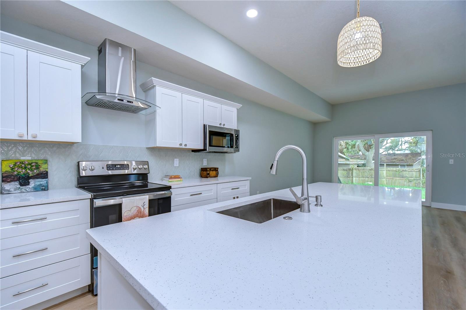 The Chef of the Home is sure to Love this Beautiful Kitchen with Quartz Countertops!!!