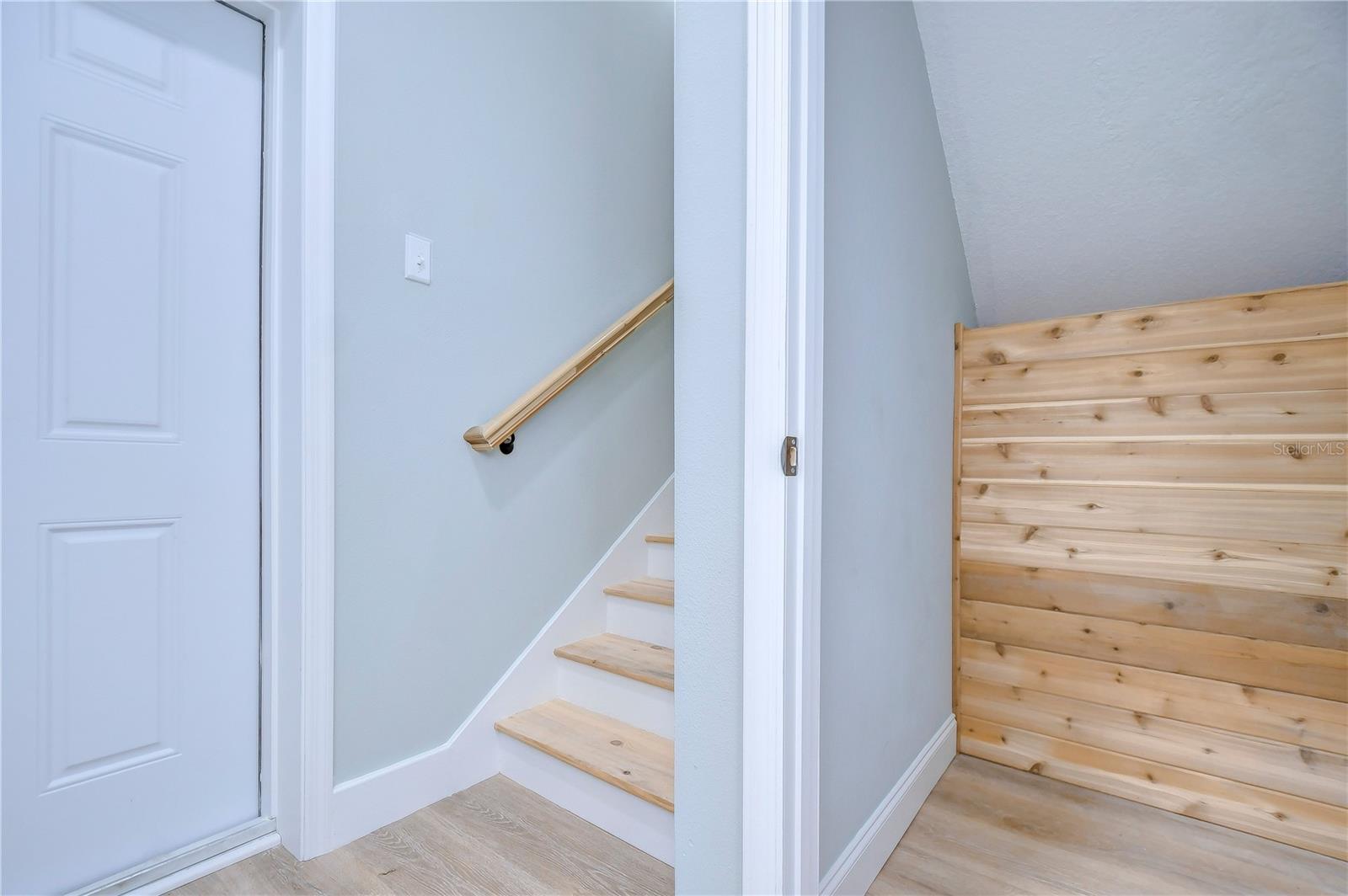 A cedar lined closet is the perfect storage space and is just off the garage.