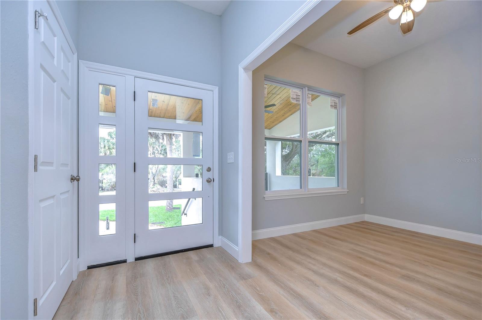 This flex space just inside the front door offers a multitude of uses.