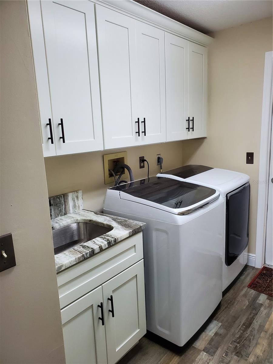 Laundry Room with Granite Countertop