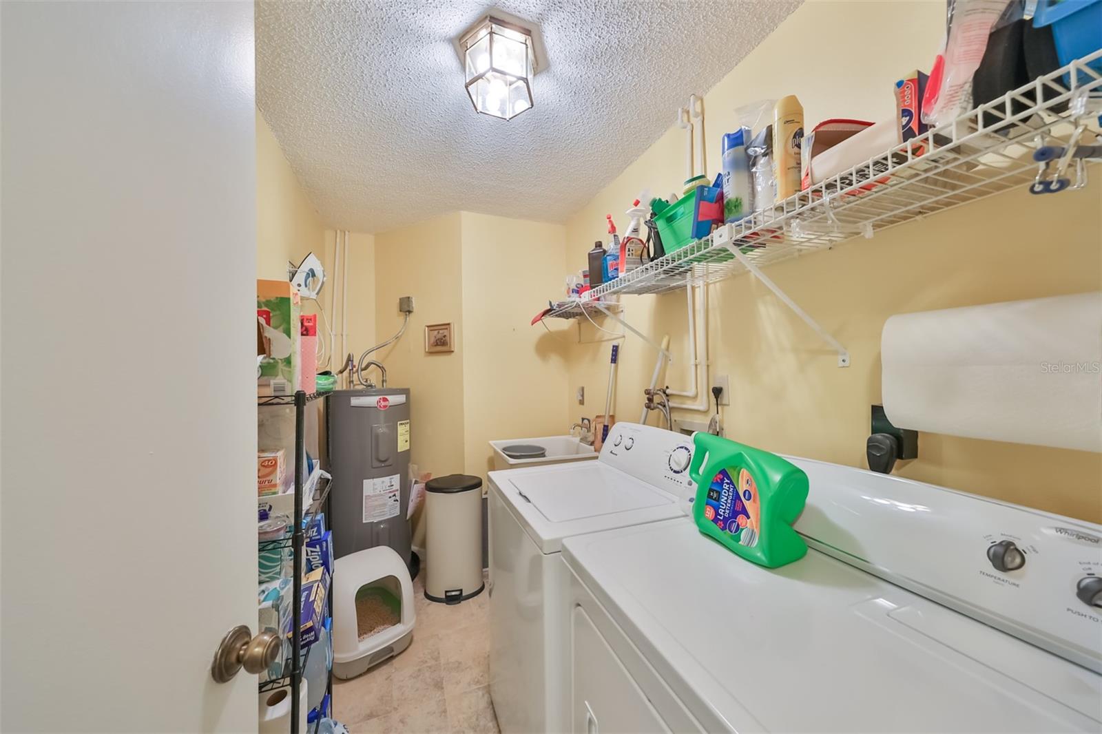 Inside Utility Room w/Laundry tub and Washer & Dryer