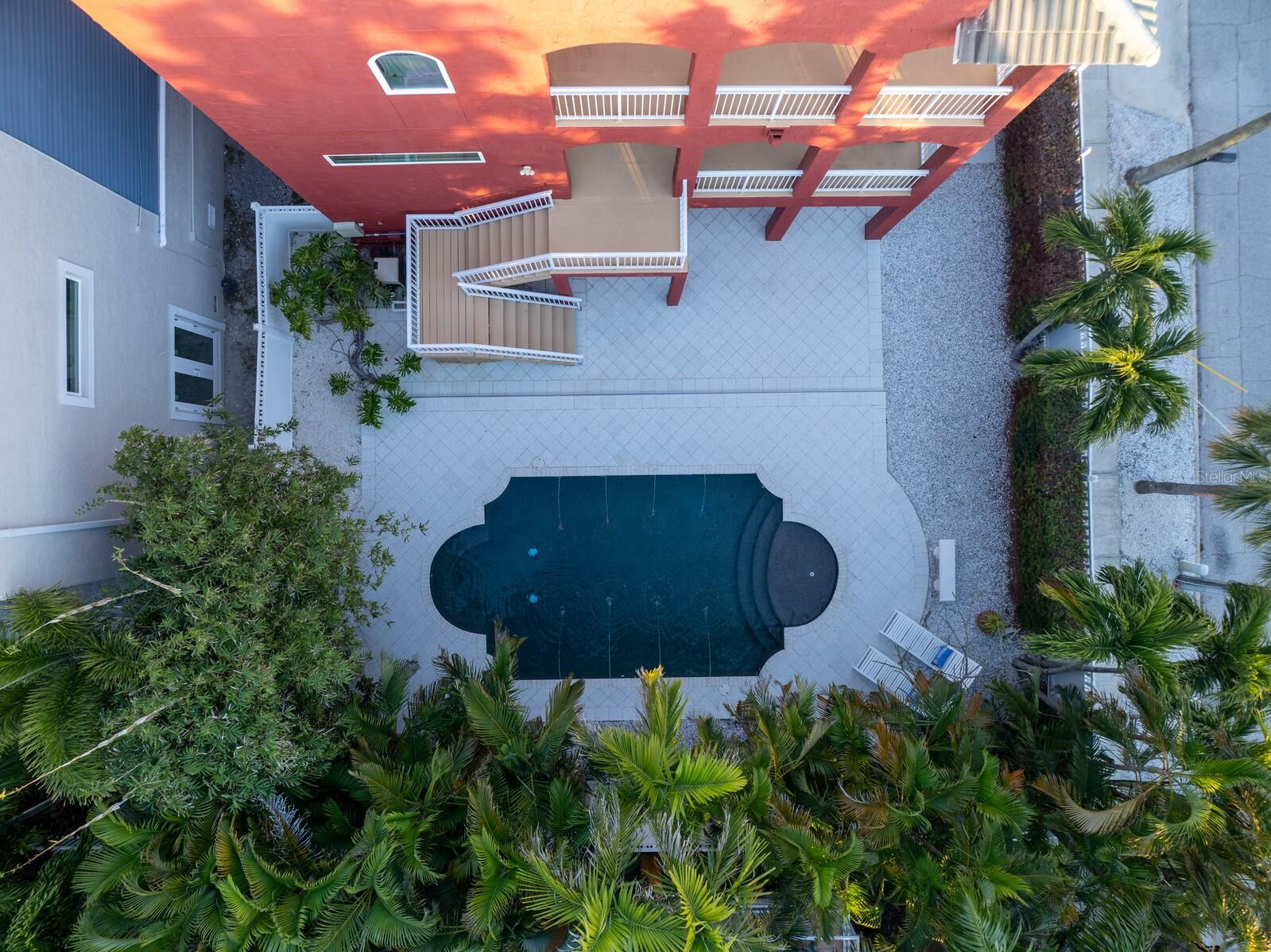 Aerial views straight up of private heated pool area