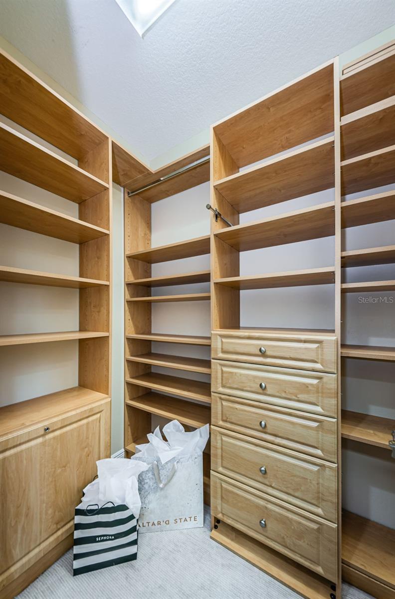 Master Closet  1 with built in shelving
