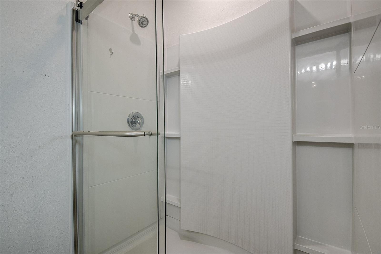 Large shower in primary bathroom.