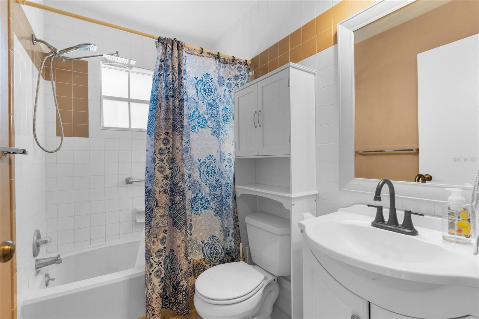 The Bathroom has a Tub/Shower Combo