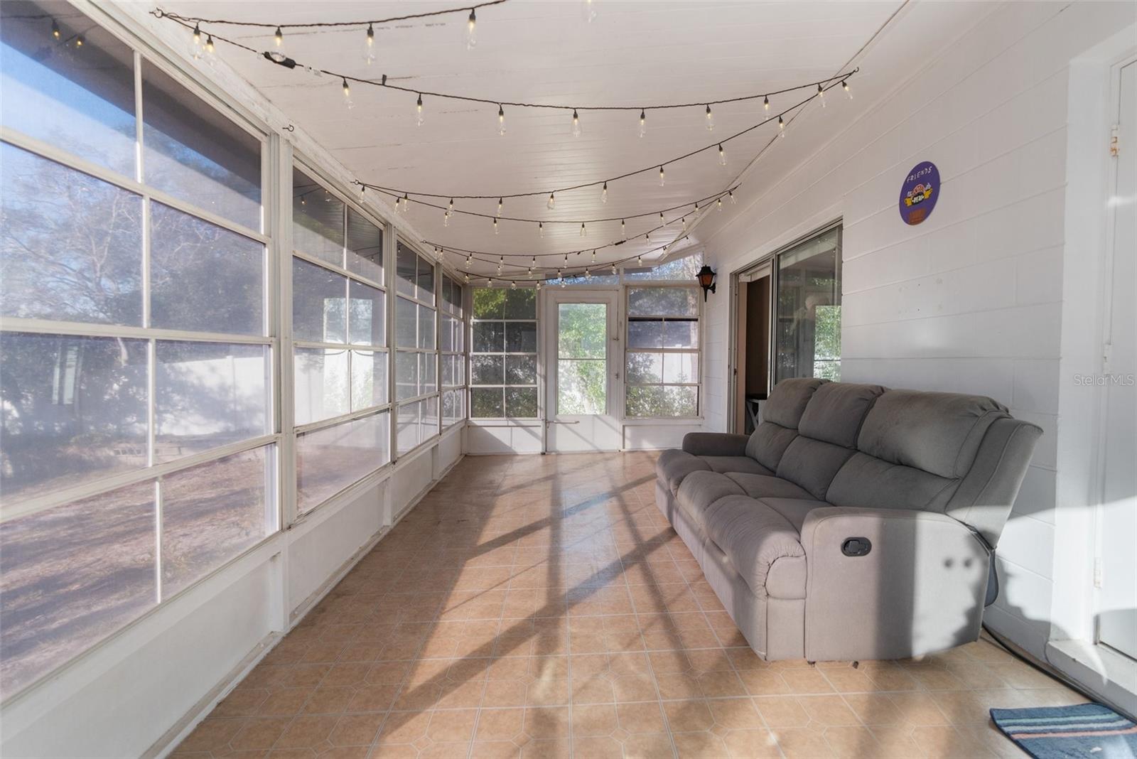 This large enclosed porch with windows that can be removed and this can be a screened in porch