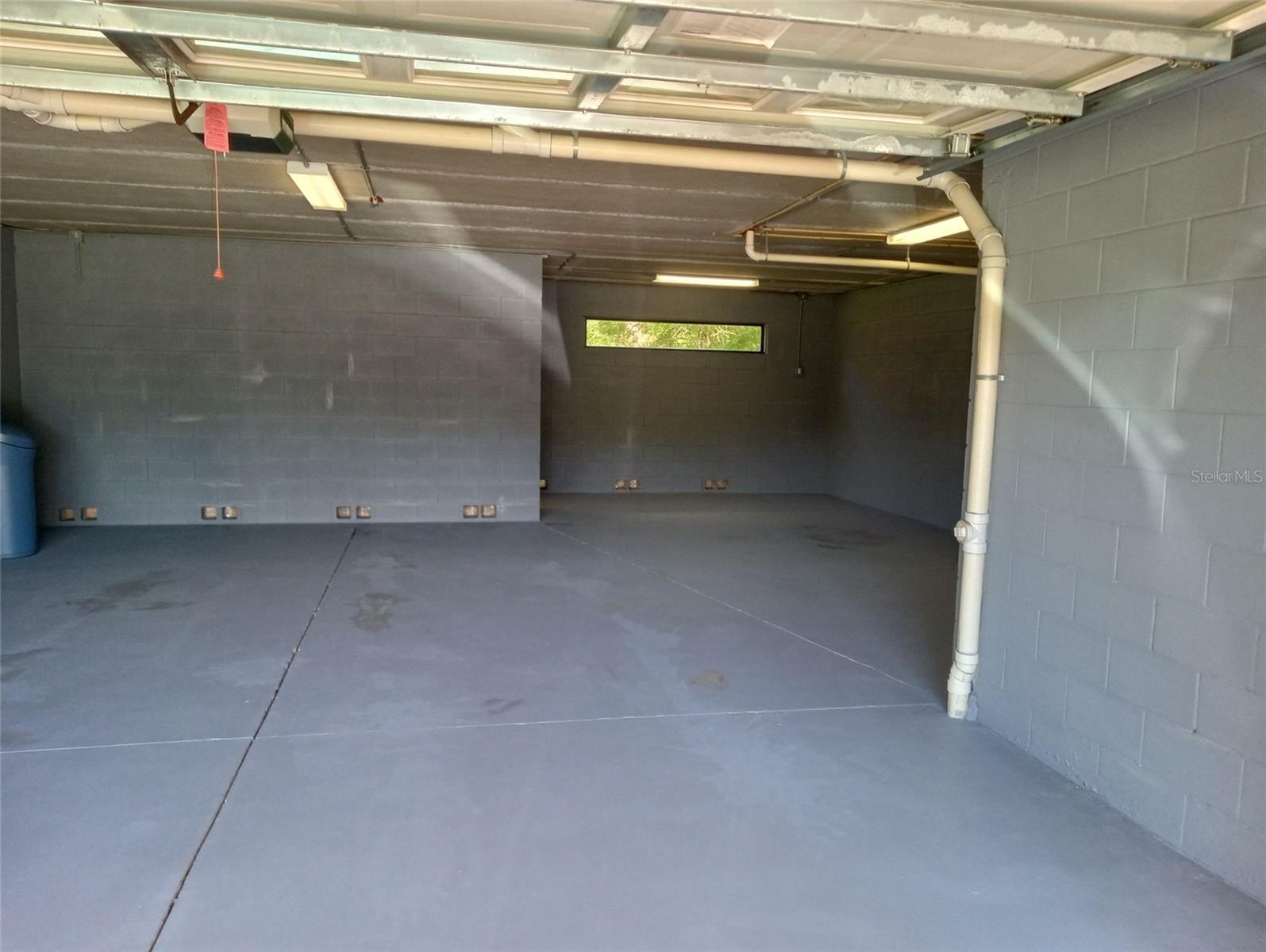 Ground Level through garage screened patio