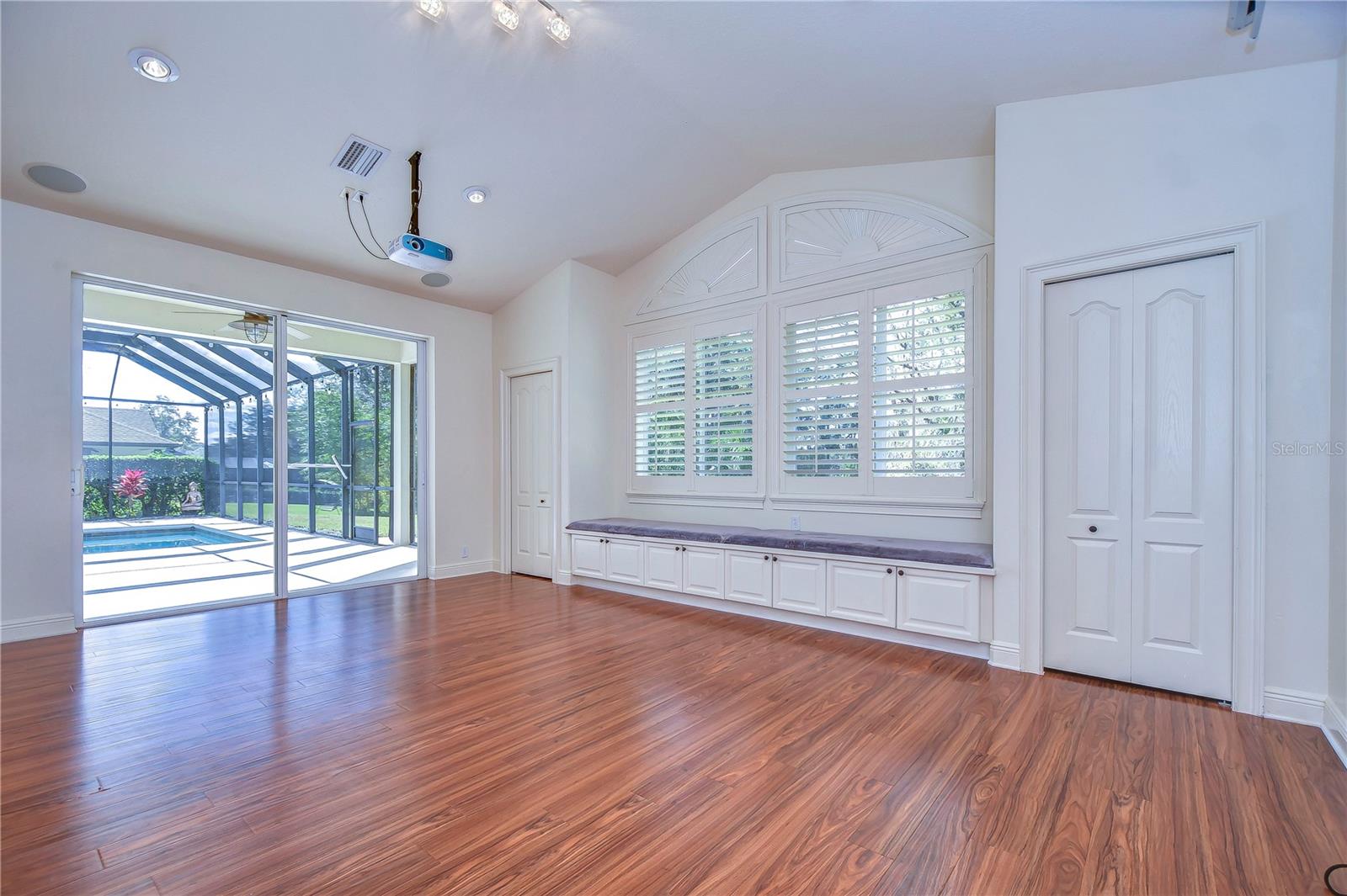 Wood floors, plantation shutters, wide base & crown moulding are just some of the features!
