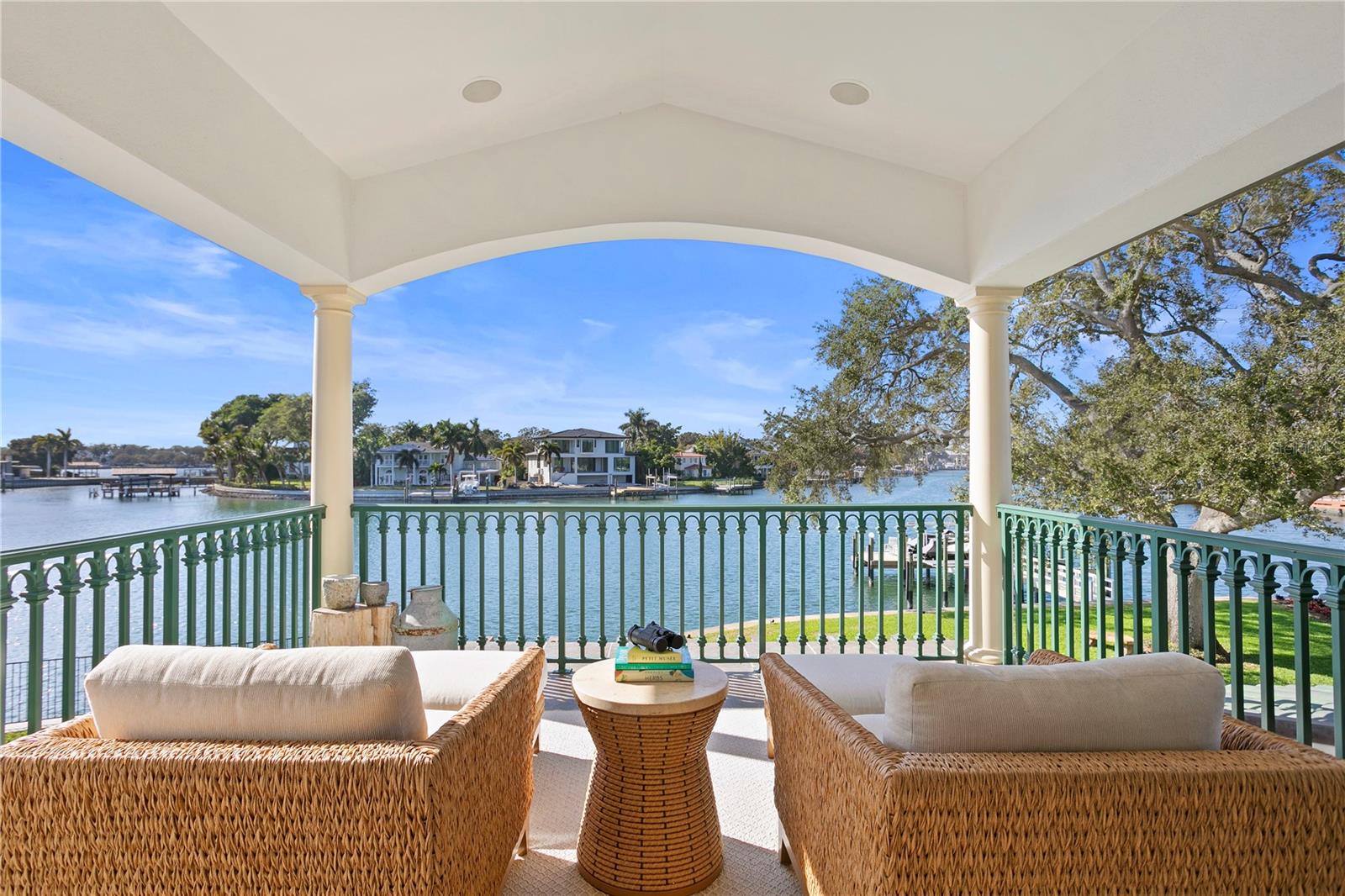 The primary bedroom balcony is a great place to enjoy your coffee all while watching the manatees play.