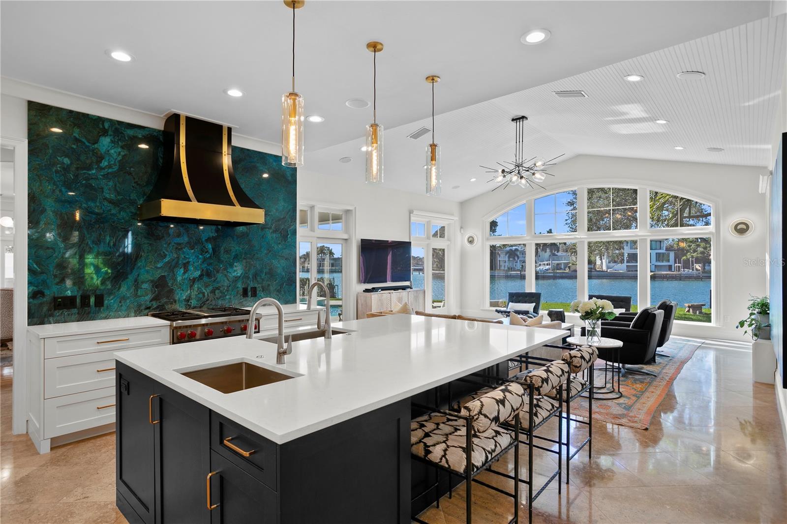 The gorgeous kitchen has everything you need with a water view!