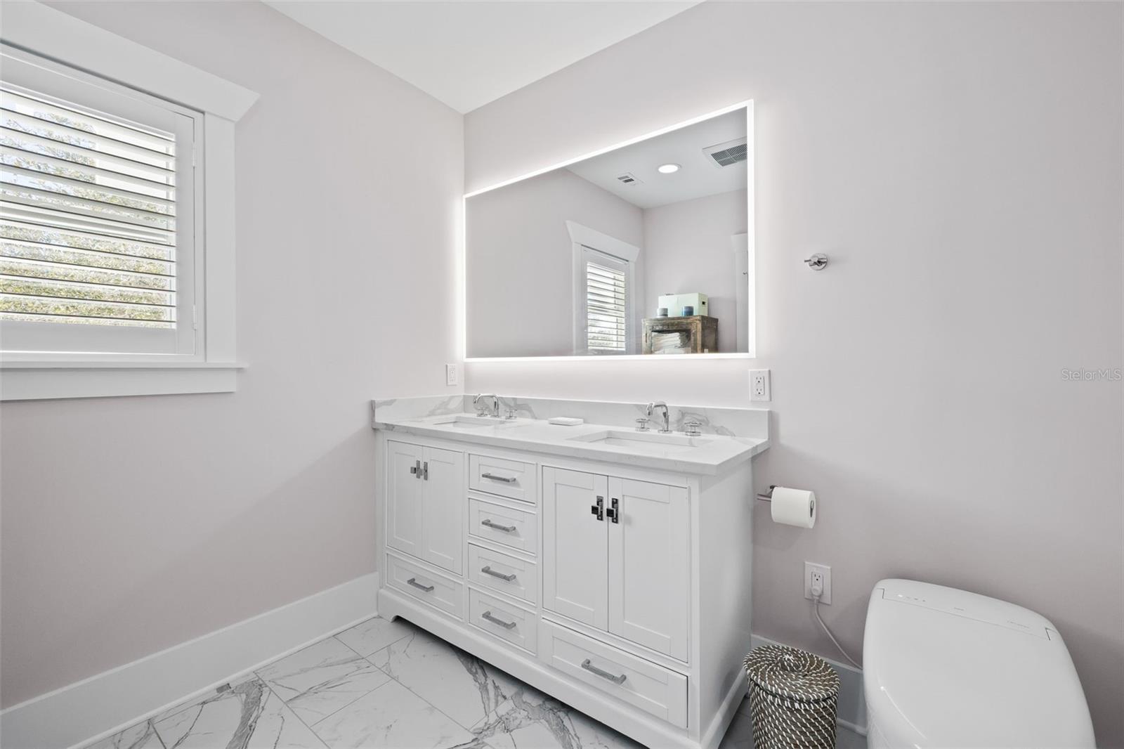 Lighted mirror and dual vanity