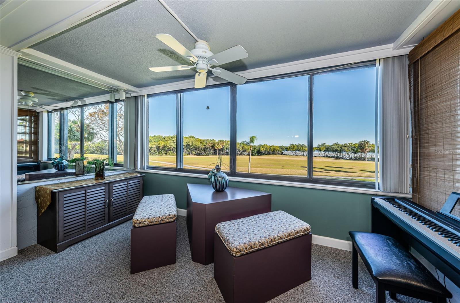 Living area with full view of Tampa Bay and 17th golf hole