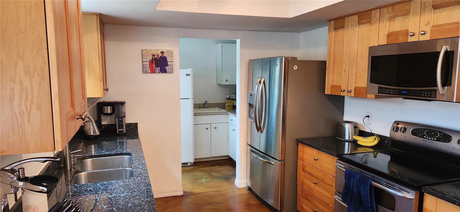 Pantry and washer/dryer off Kitchen