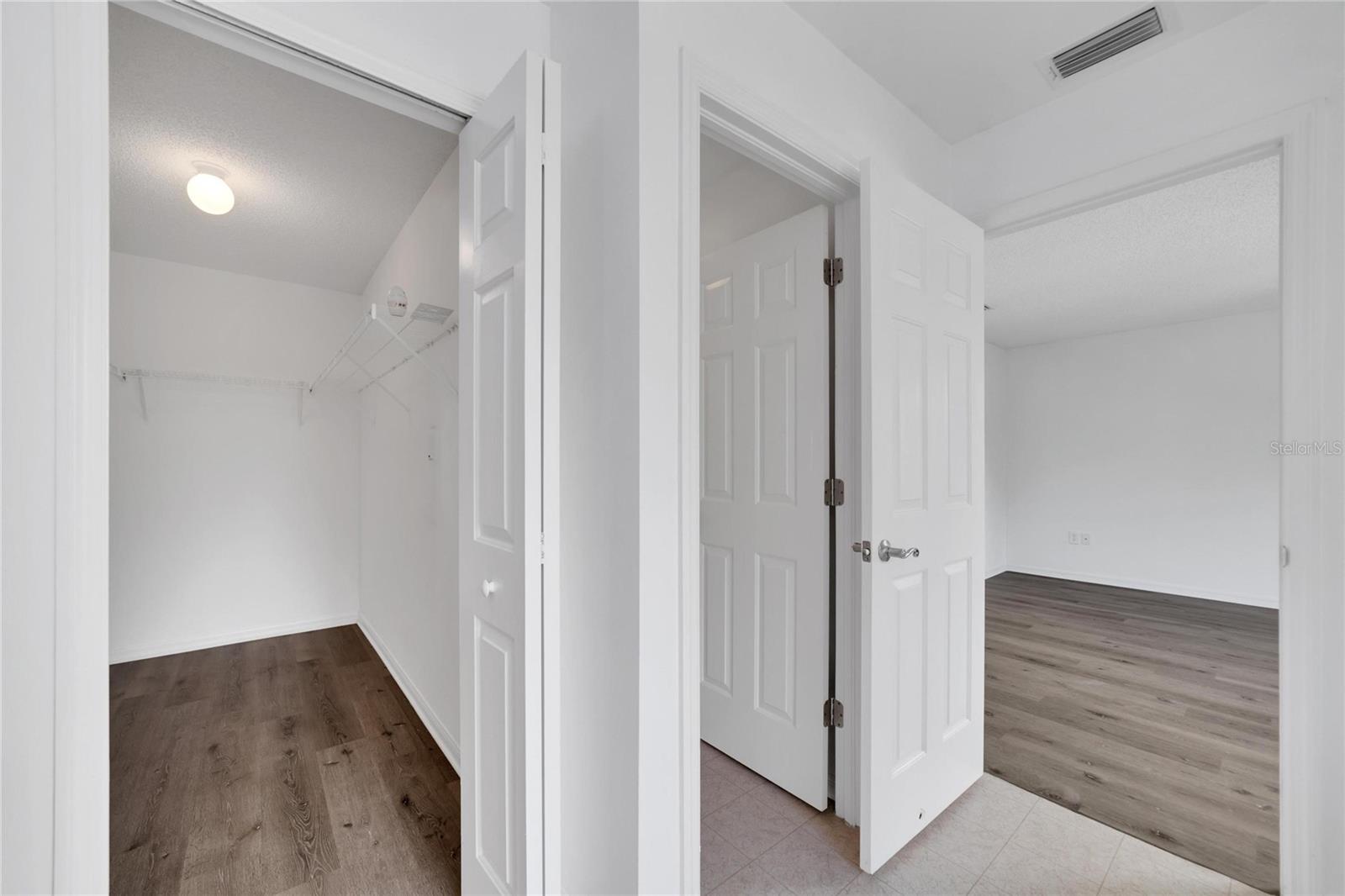 Primary Bedroom Walk-In Closet and Water Closet/Private Toilet