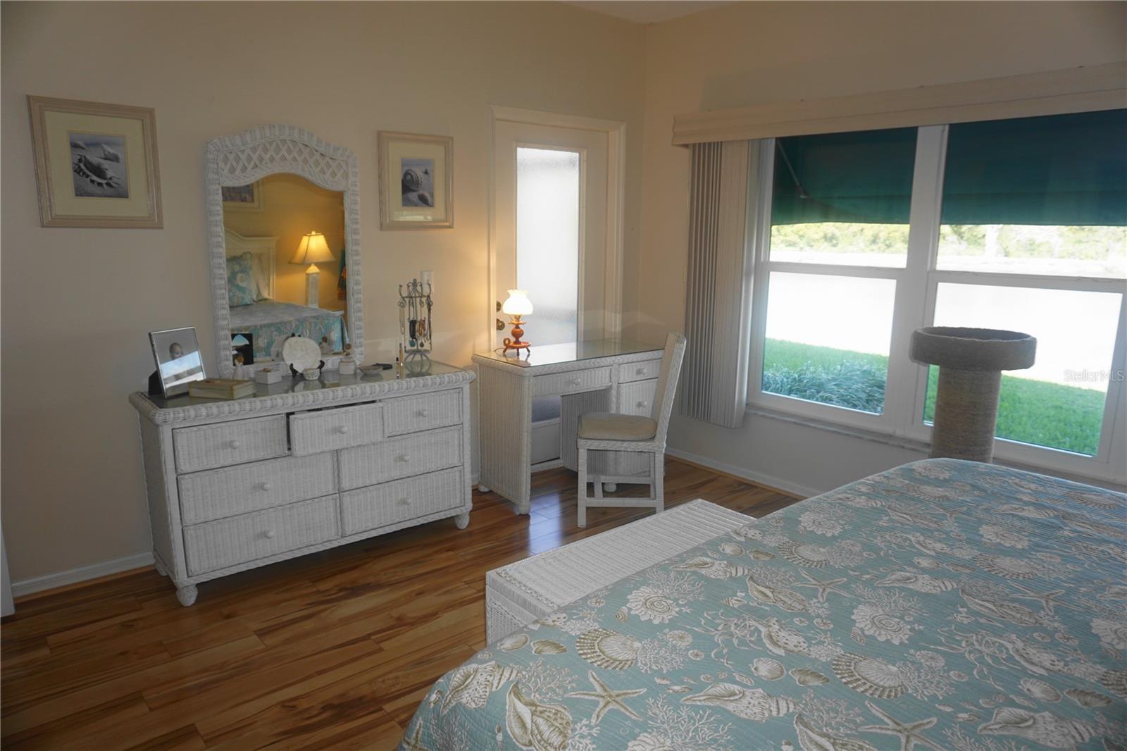 Spacious primary suite also features beautiful water views!