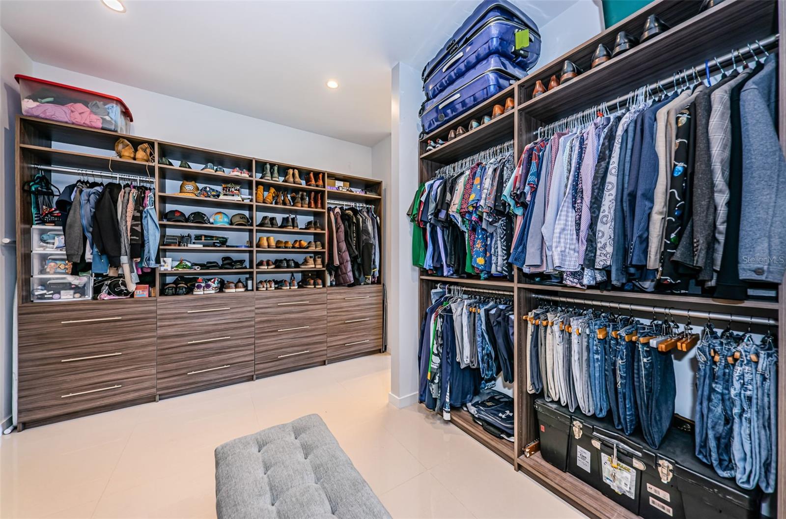 Unbelievable walk-in closet with a separate laundry room and additional storage!