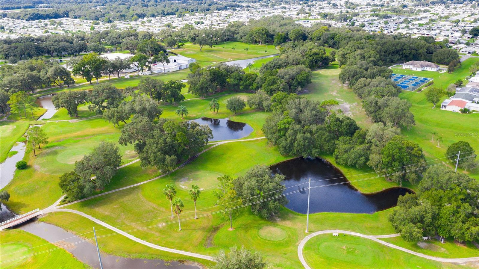 Community has three nine-hole golf areas.
