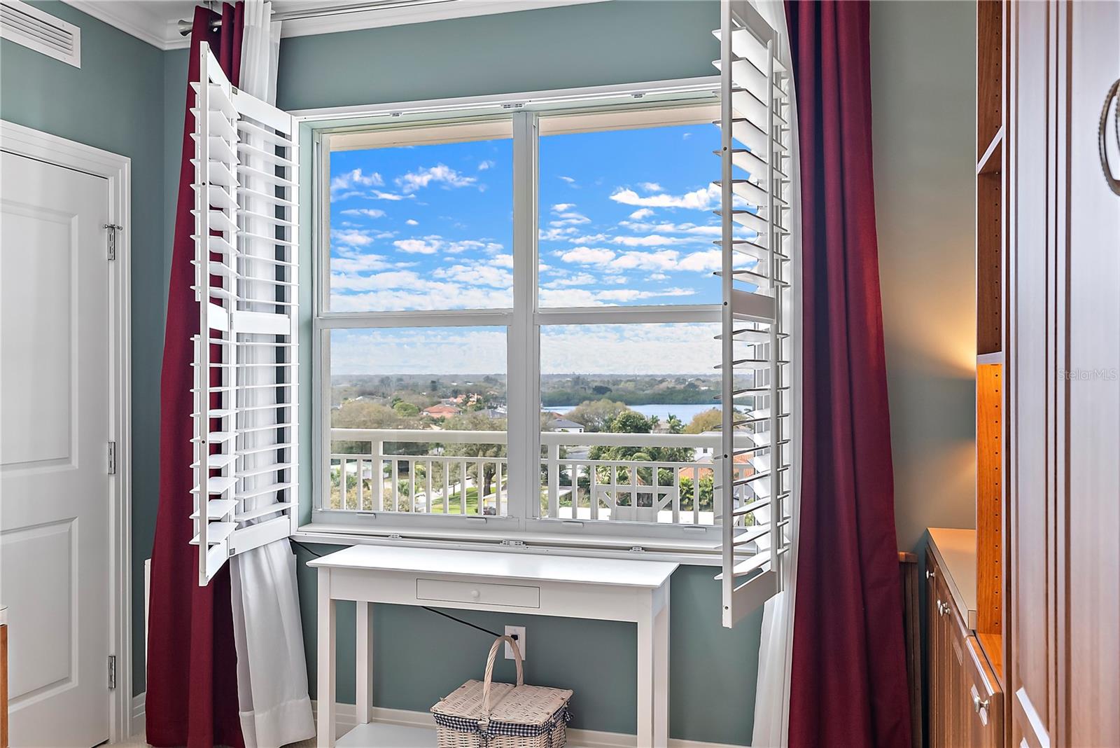 Guest Bedroom features beautiful water views of Smacks Bayou and Snell Isle.