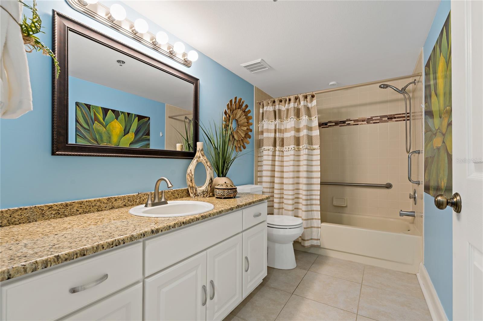 GUEST BATHROOM WITH SOAKING TUB/SHOWER COMBO!