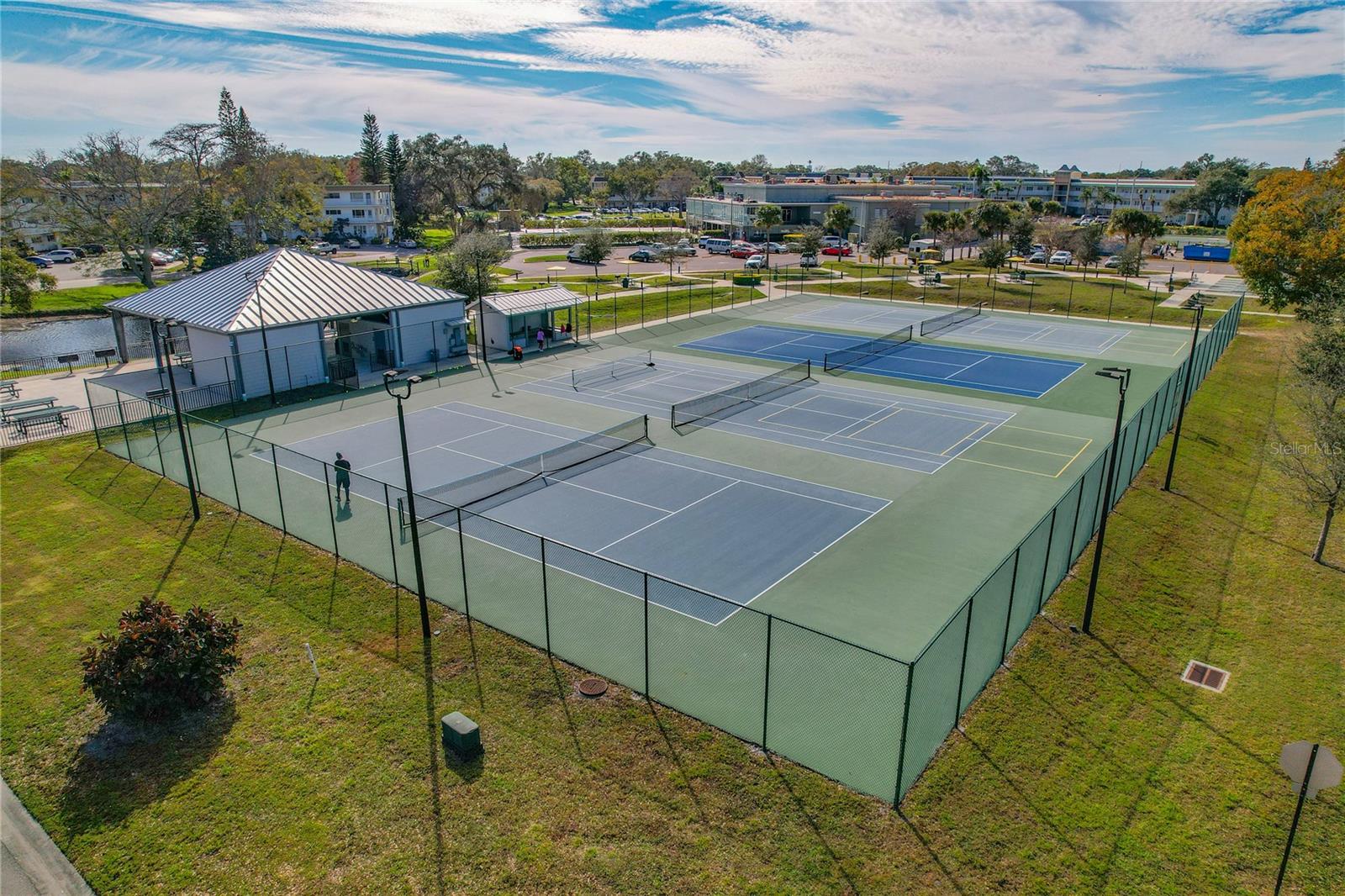 4 TENNIS COURTS IN THE COMMUNITY!