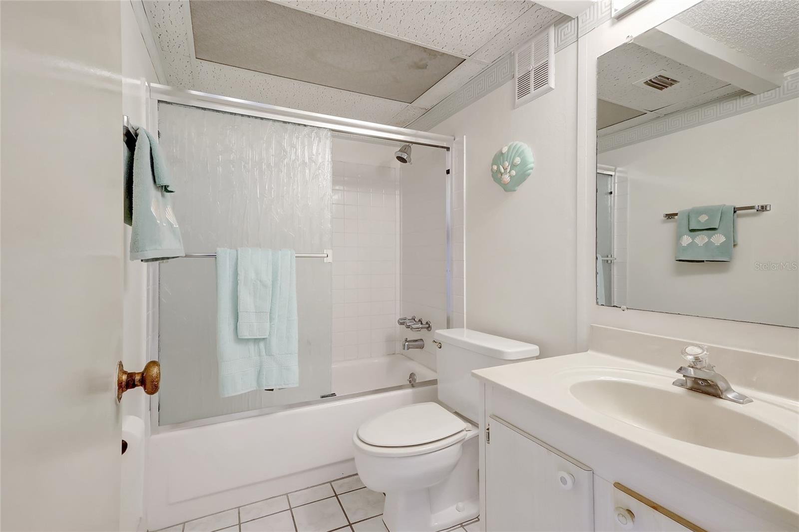 Bathroom 2 has a shower/tub combo.
