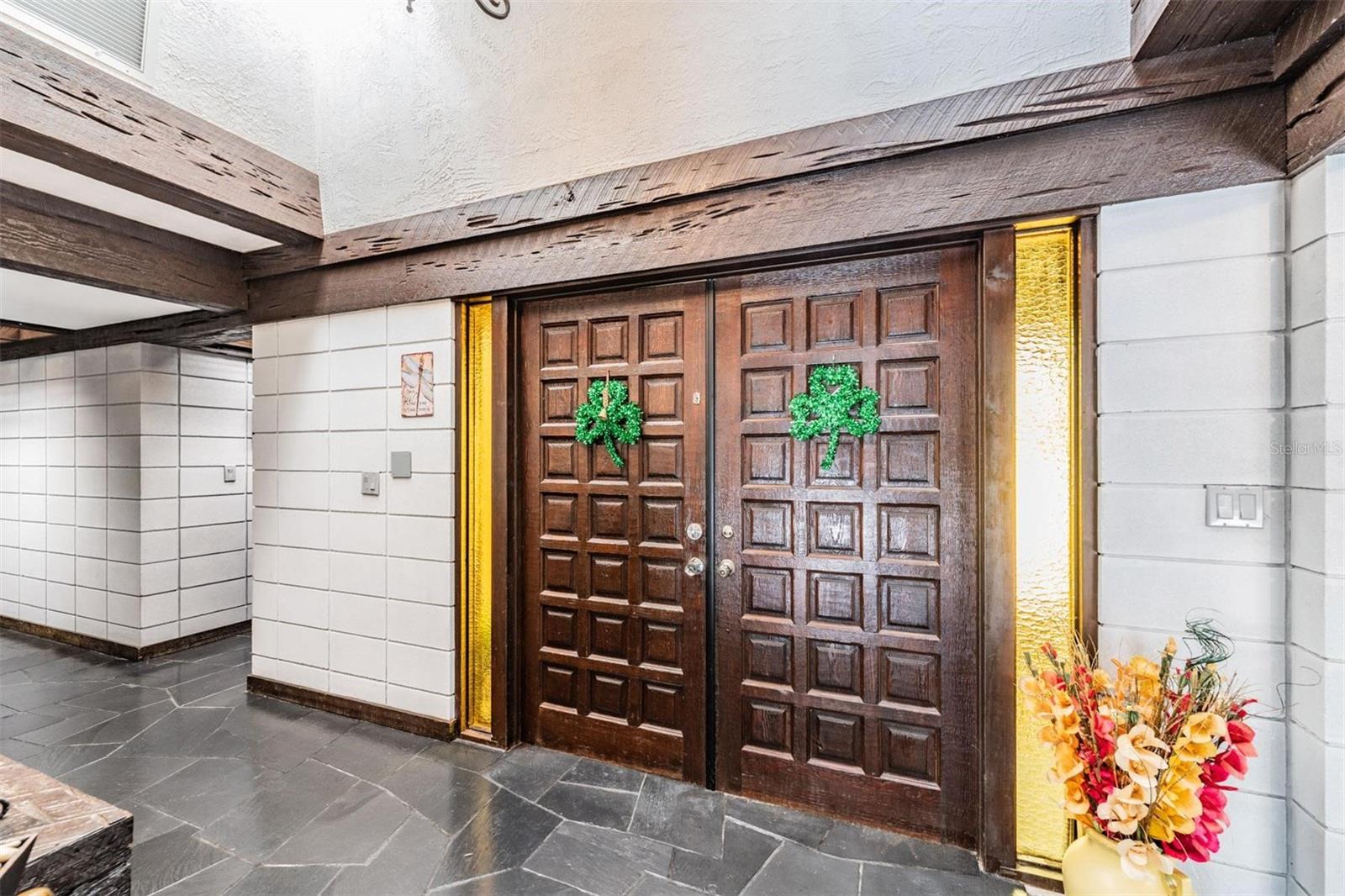 Inside view of Beautiful Double Entry Doors with Slate Flooring
