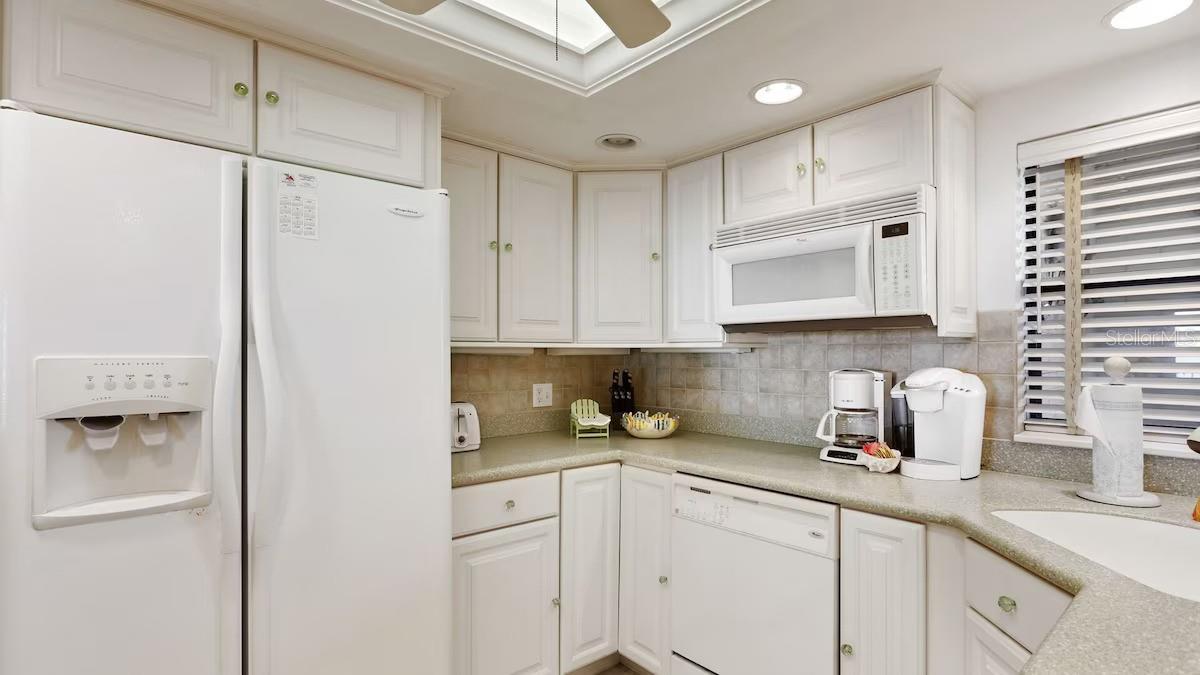 Side-By-Side Refrigerator, Lazy Susan cabinet in the corner.