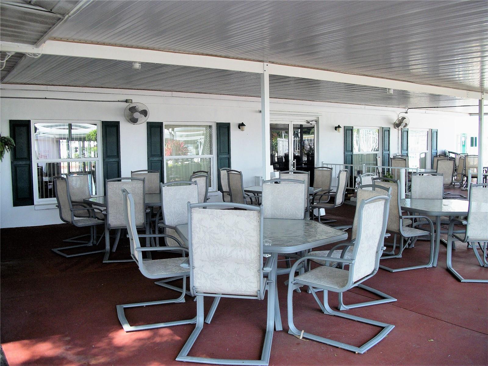 Patio on back side of clubhouse is great spot for socializing or hosting outdoor events.