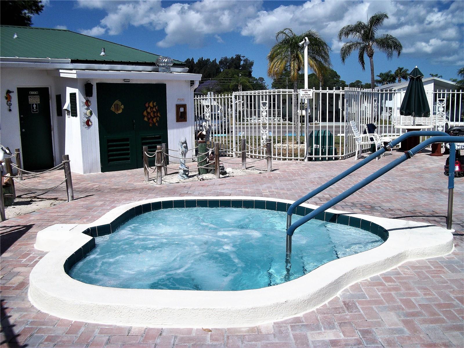 Pool area offers a spa to melt away the stresses of your day or to just relax.